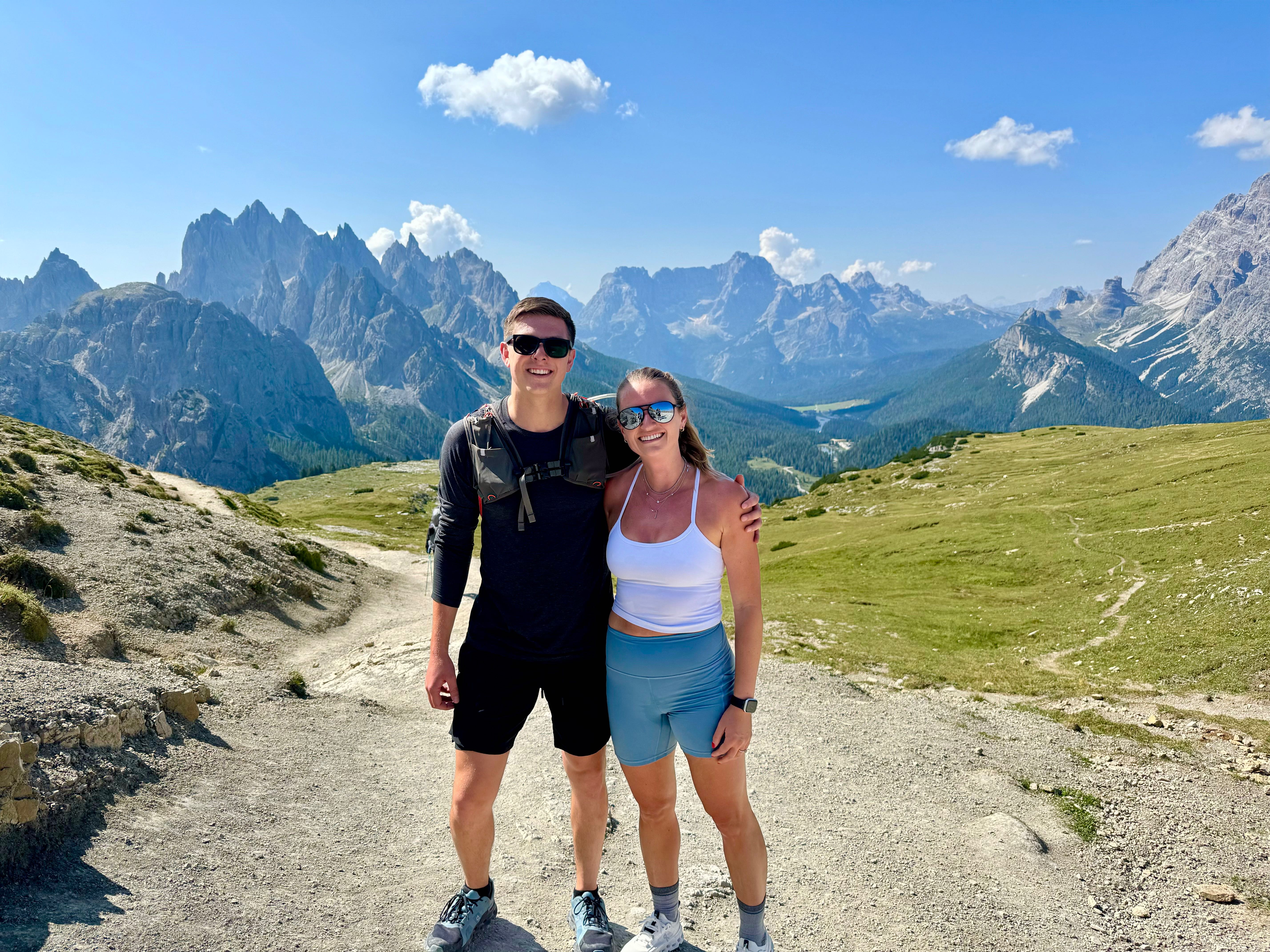Adam and Julianna hiking in the mountains