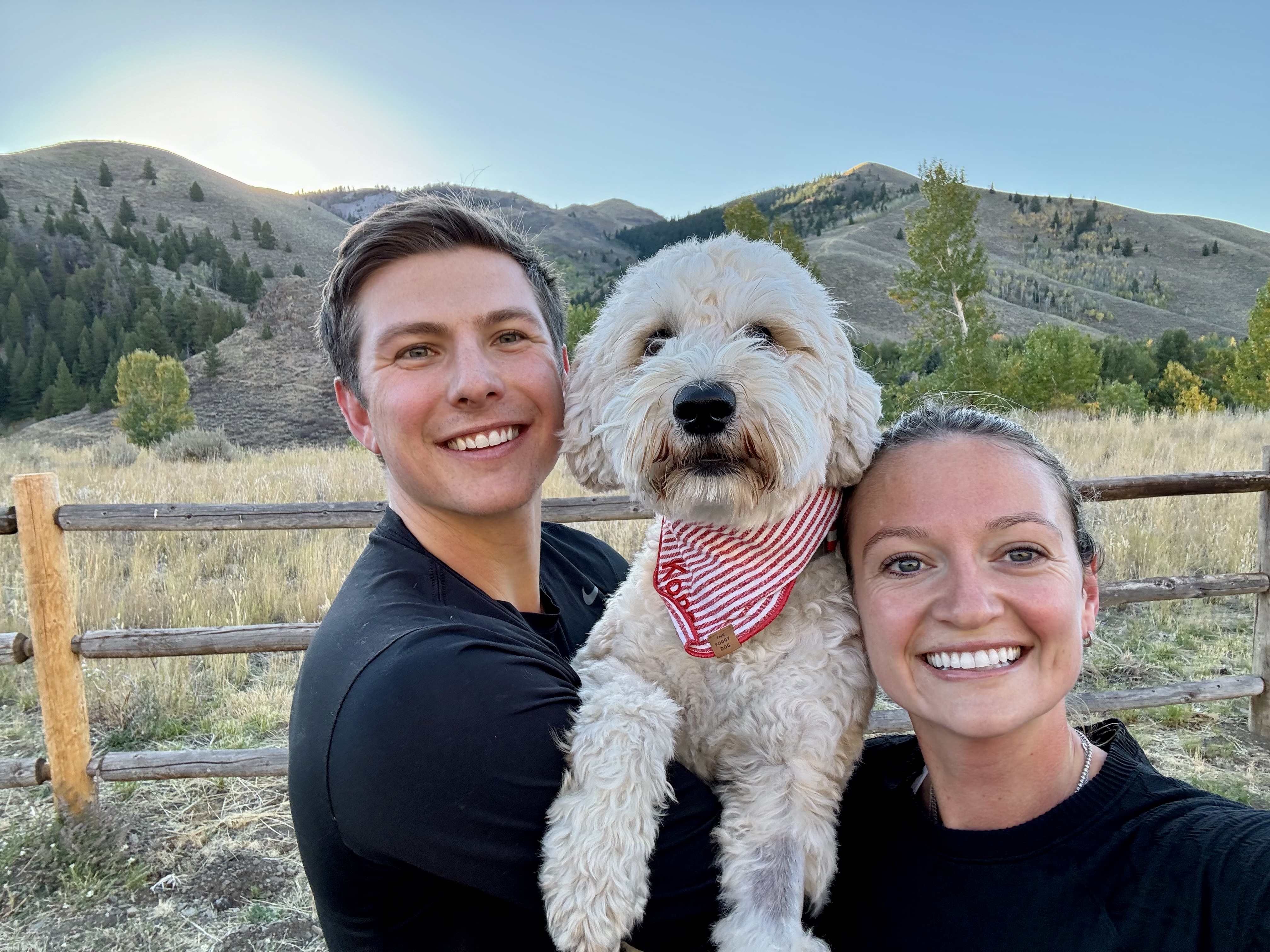 Adam and Julianna with their dog in Sun Valley mountains